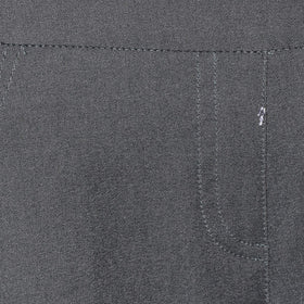 SLIM-SATION charcoal ankle pants provide versatile office-to-golf wear with wrinkle resistance.