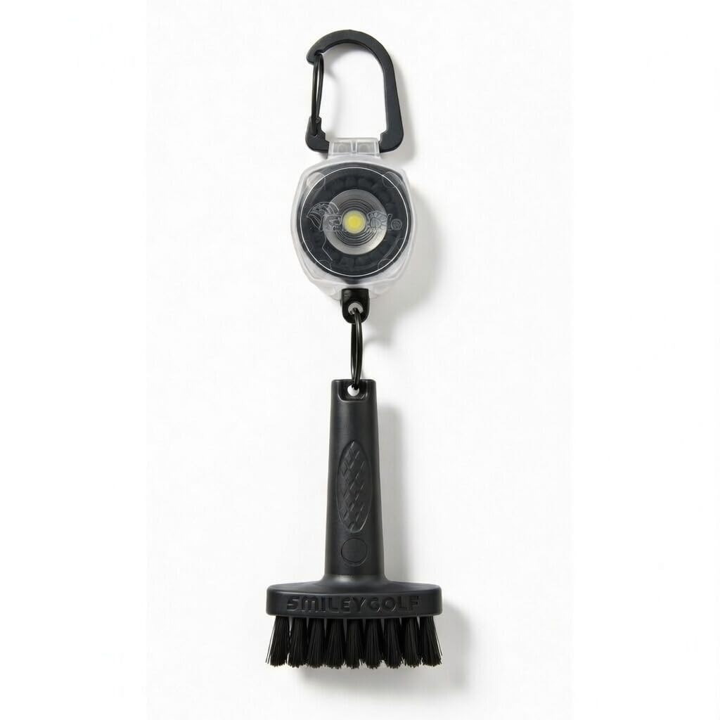Smiley Golf mini brush with clear retractable clip for fast club-face cleaning.