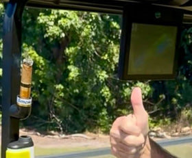 Cradle grip securing cigar on uneven terrain
