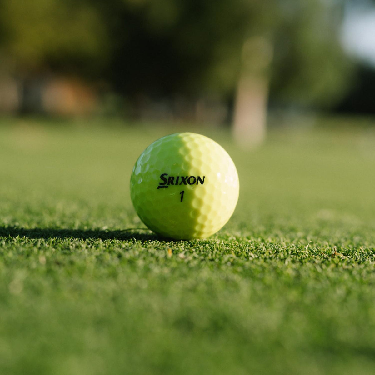 Srixon Soft Feel 14 yellow greenside spin emphasizes precise approach shots.