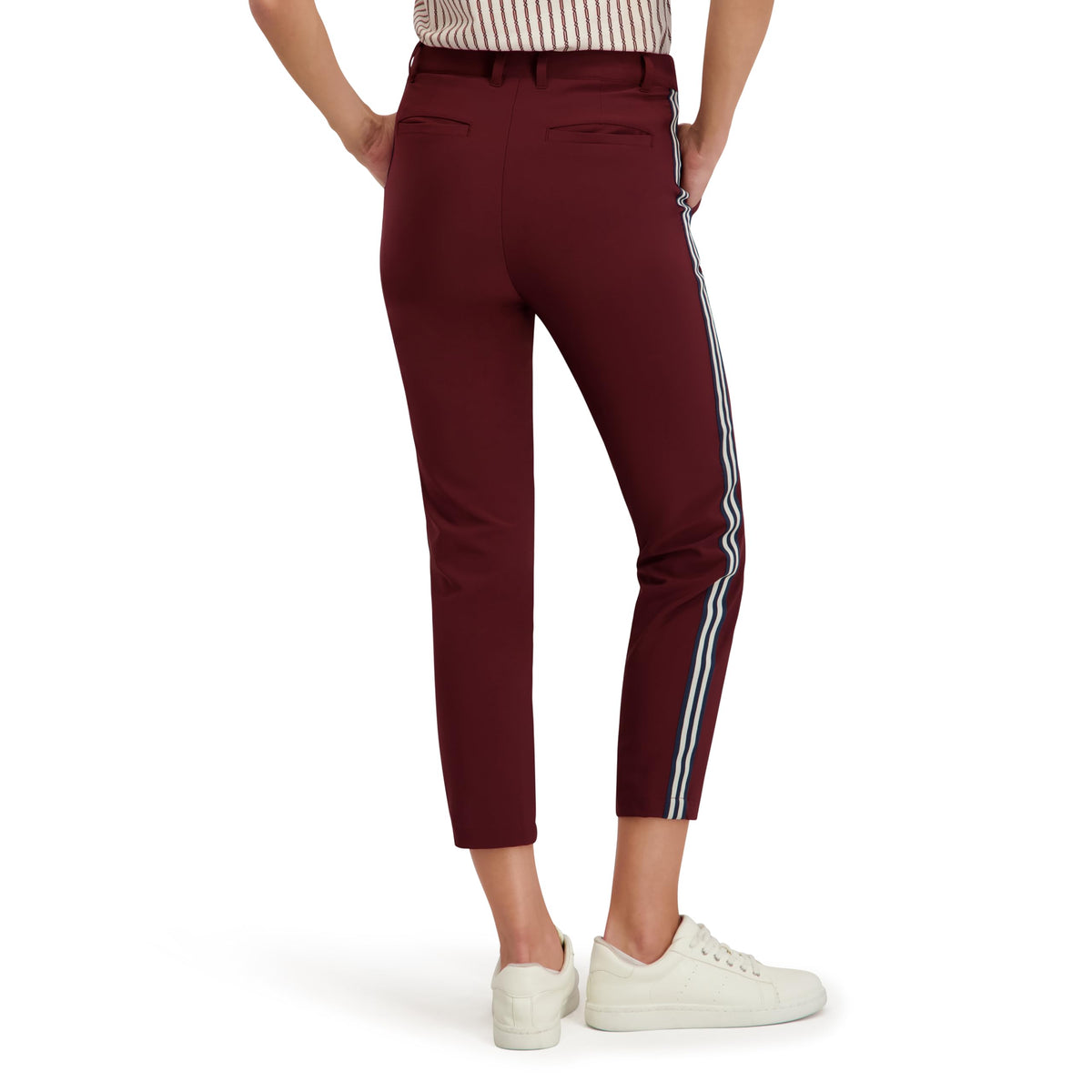 Stella Parker pant pocket detail showing practical storage on course.