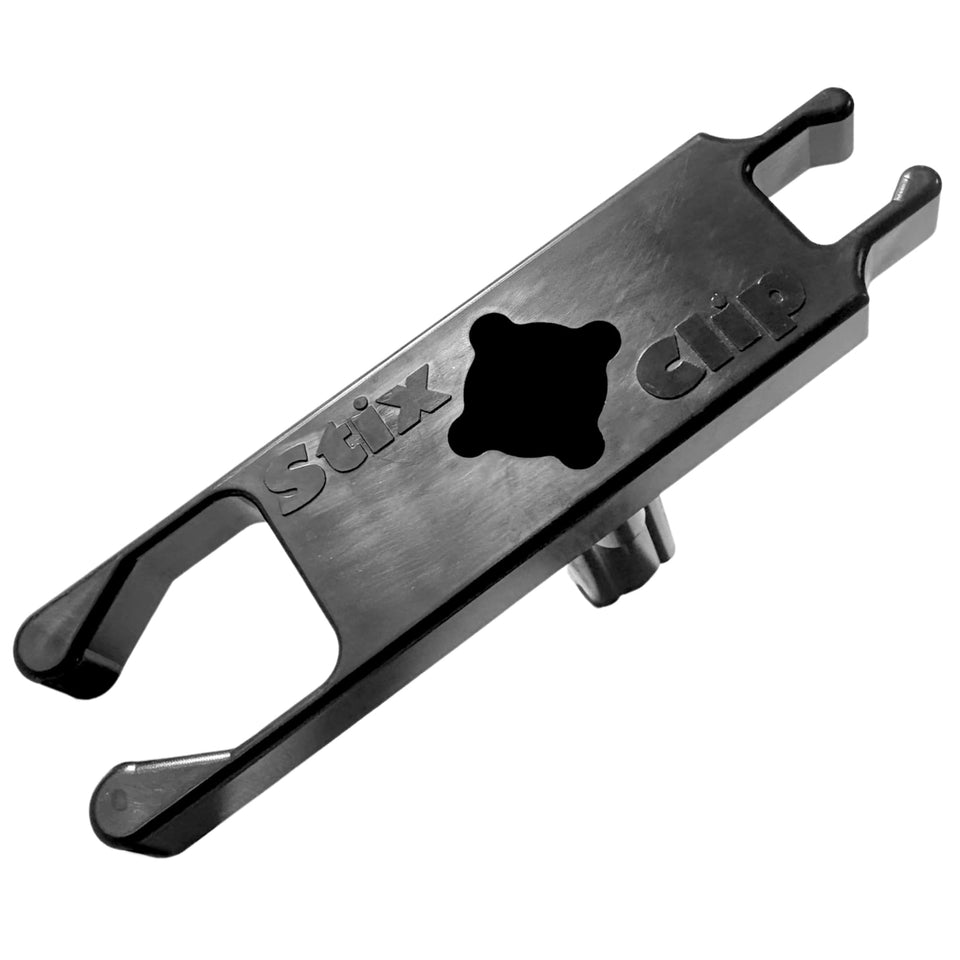StixClip ball retriever holder secures gear outside the bag for quick access.