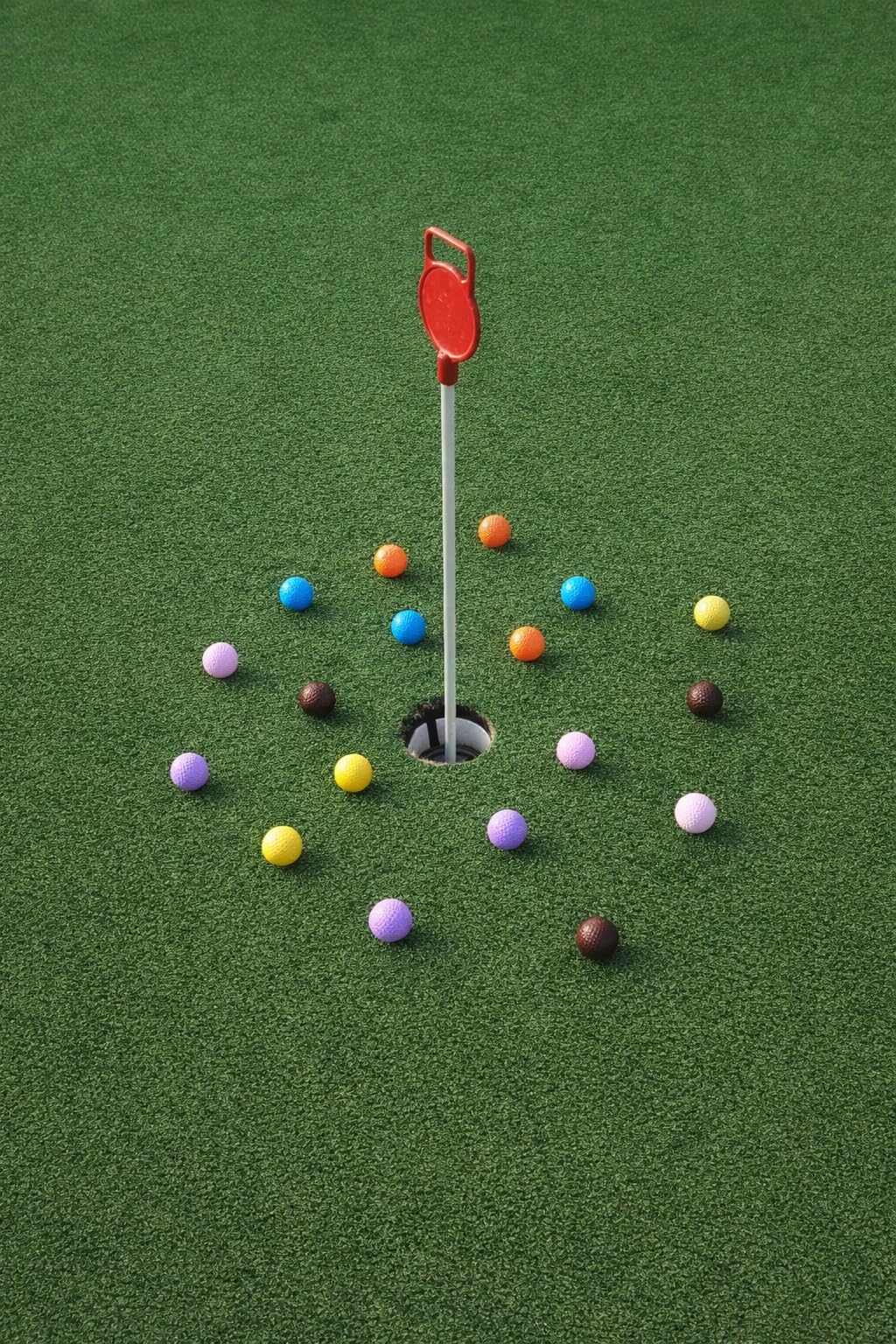 StrikeEdge kids practicing with colored golf balls fosters confidence and rhythm.