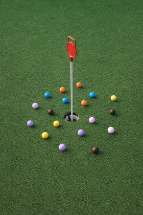 StrikeEdge kids practicing with colored golf balls fosters confidence and rhythm.