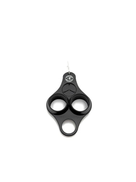 Stroke & Distance silicone golf ball holder front view showing compact clip-on design