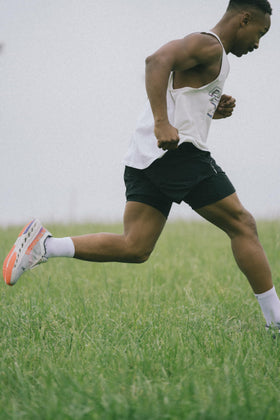 Swiftwick MAXUS mid-crew socks moisture-wicking fibers keep feet dry during workouts.