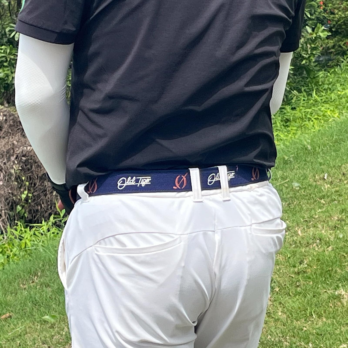 Swig Sip belt on pants shows five-hole adjustability for comfort