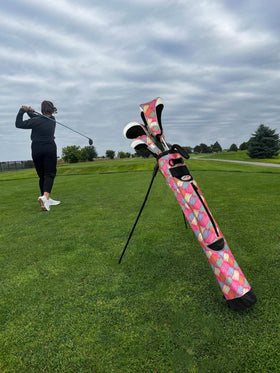 Taboo Fashions Sunday bag holds up to eight clubs safely and neatly.