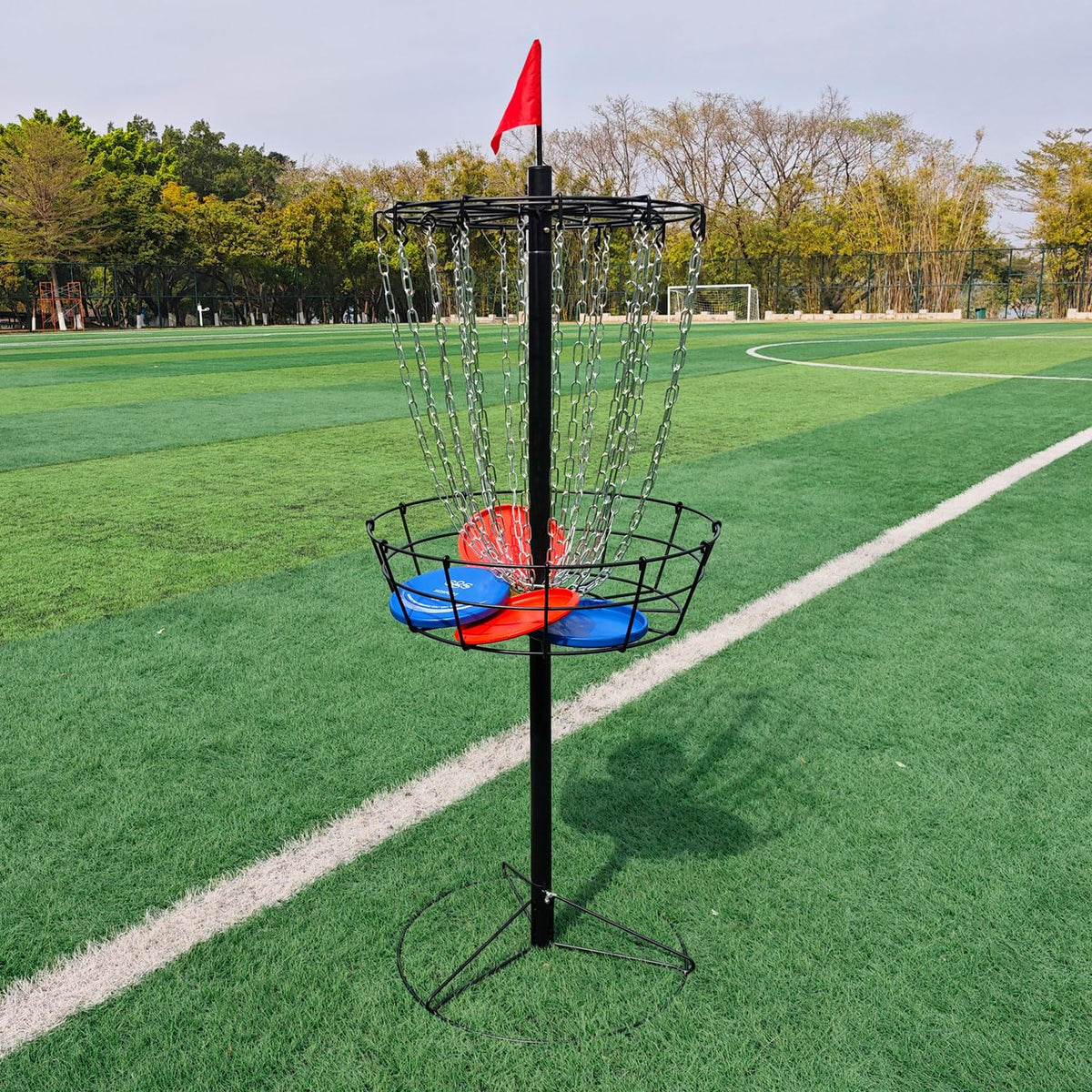 TARUMG disc golf basket fully assembled and ready for backyard sessions