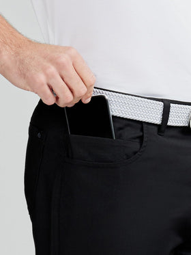 Tasc Performance straight-leg pants offer daily versatility and motion-friendly design.