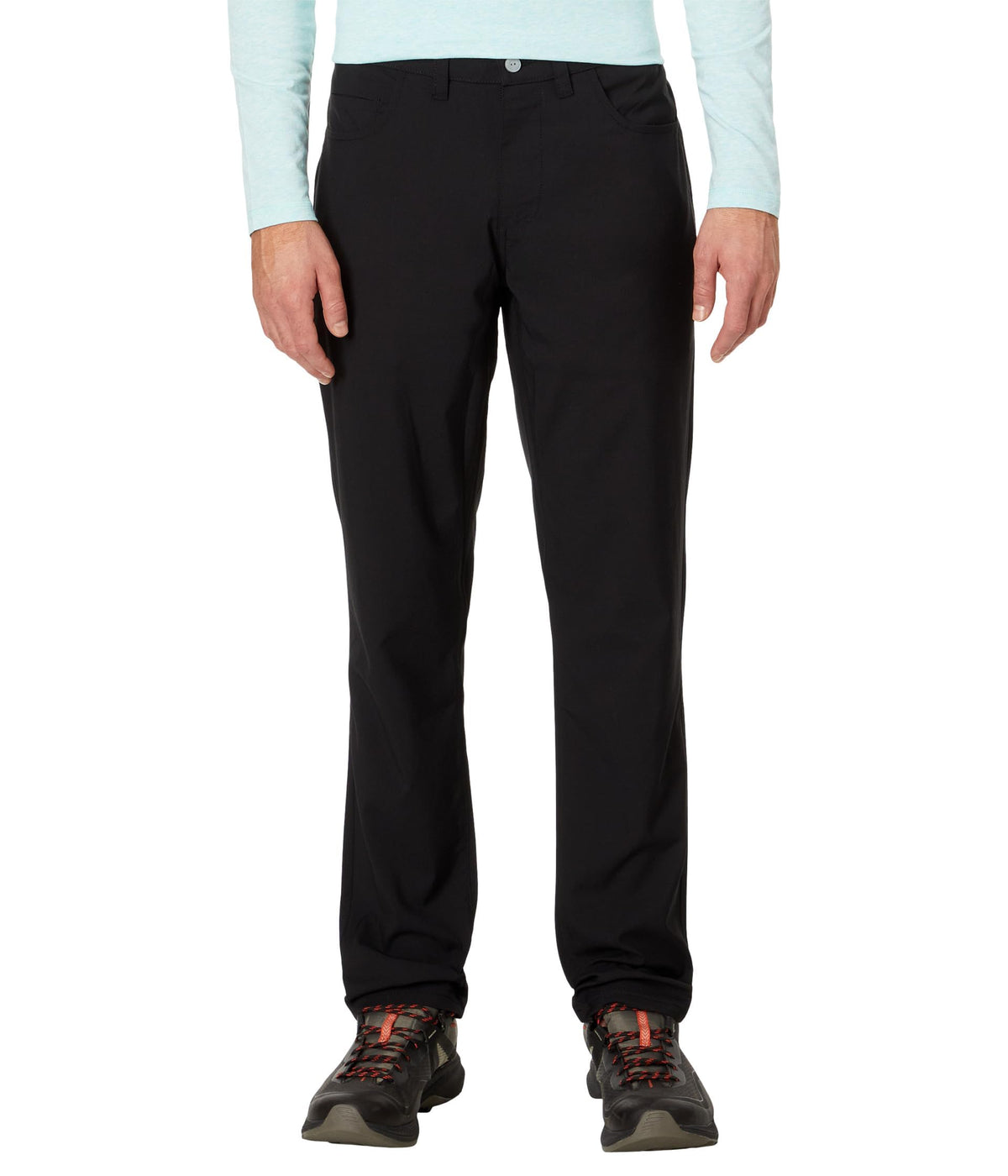 Tasc Motion Pants worn during travel show easy layering and quick-dry feel.