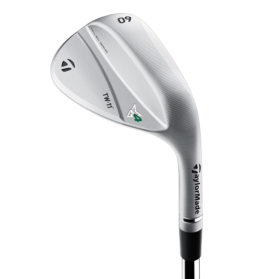 TaylorMade MG4 Chrome wedge face closeup with laser-etched channels for wet-spin benefits.