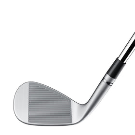 TaylorMade MG4 Chrome wedge raw surface detail emphasizing bite on soft greens