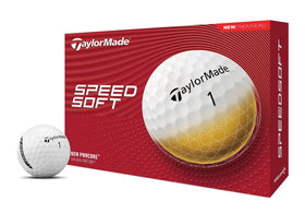 TaylorMade SpeedSoft golf ball yellow close-up highlighting soft feel and visibility