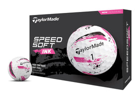 TaylorMade SpeedSoft Ink Pink golf ball with vibrant splatter design for easy visibility.