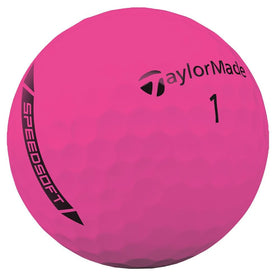 TaylorMade SpeedSoft Pink ball close-up showing soft feel and color.