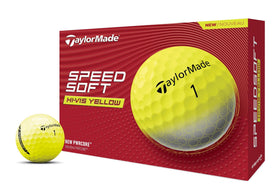 TaylorMade SPEEDSOFT Yellow ball on green, optimized for soft feel and iron accuracy.