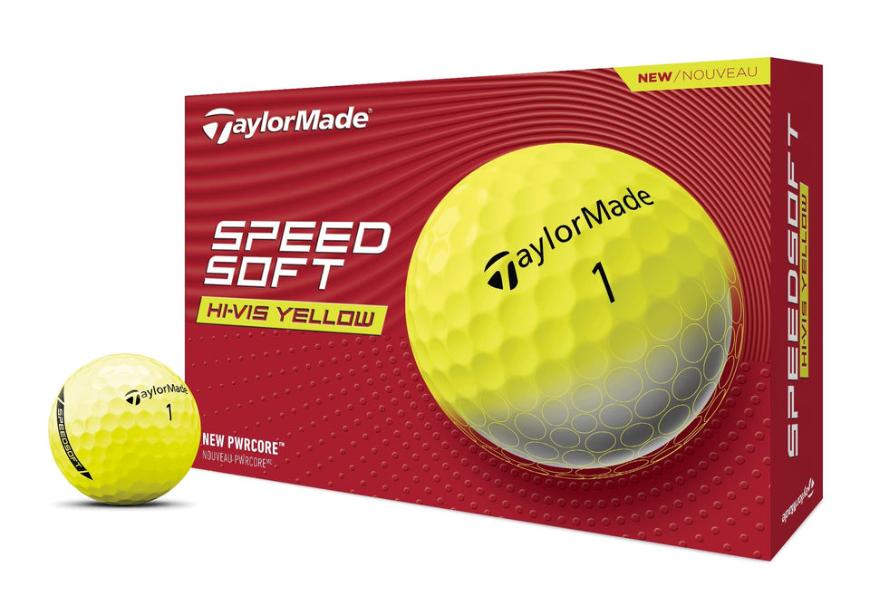 TaylorMade SPEEDSOFT Yellow ball on green, optimized for soft feel and iron accuracy.