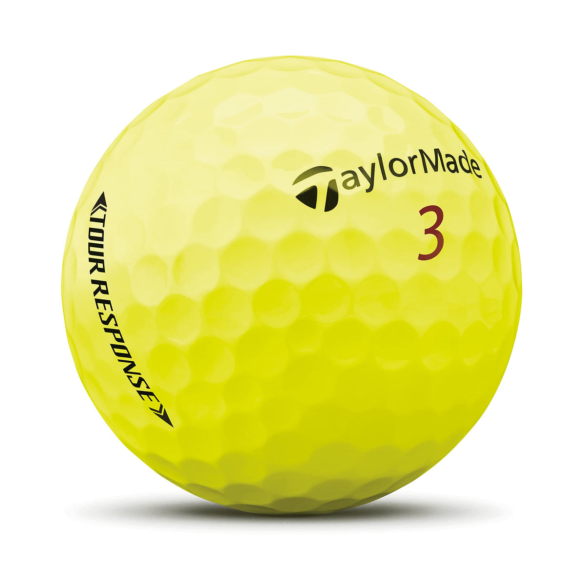TaylorMade Tour Response Yellow Dozen ball close-up reveals soft urethane cover for better feel.