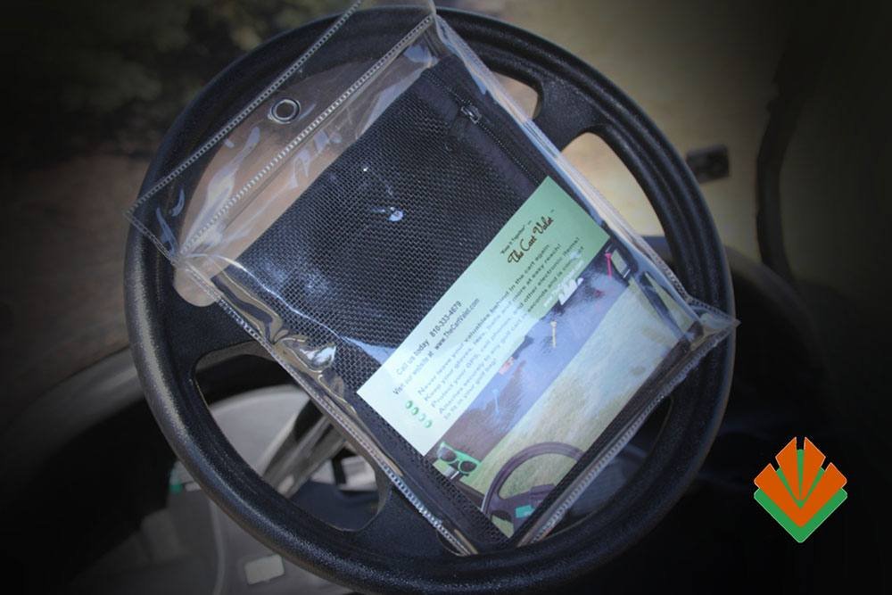 The Cart Valet Golf Cart Organizer features three mesh pockets for quick-take items.