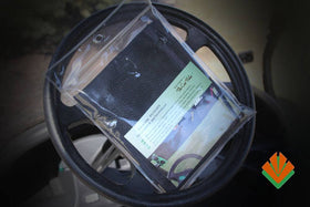 The Cart Valet Golf Cart Organizer features three mesh pockets for quick-take items.