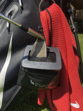 The Club Washer bag clip-on keeps cleaning gear accessible on any golf bag