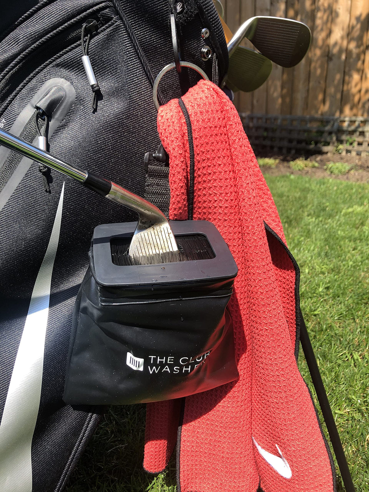 The Club Washer club head in water technique cleans grooves after every swing