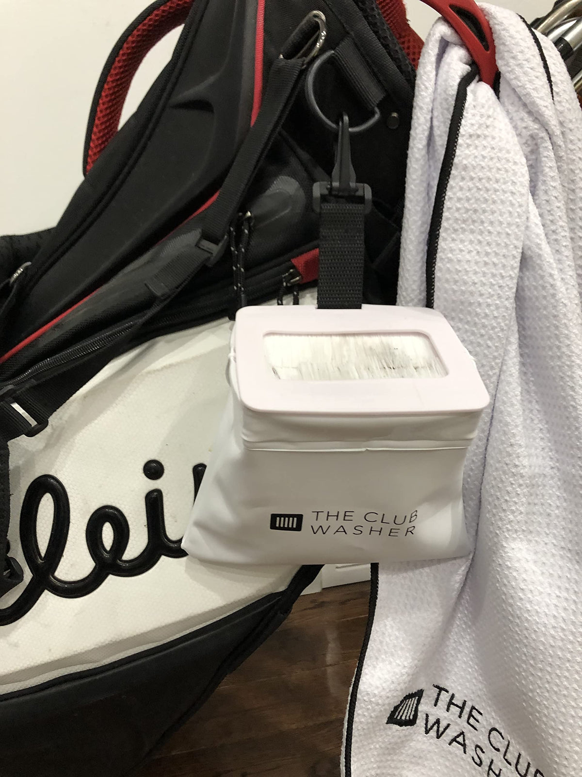 The Club Washer uses a water bag to rinse and scrub efficiently