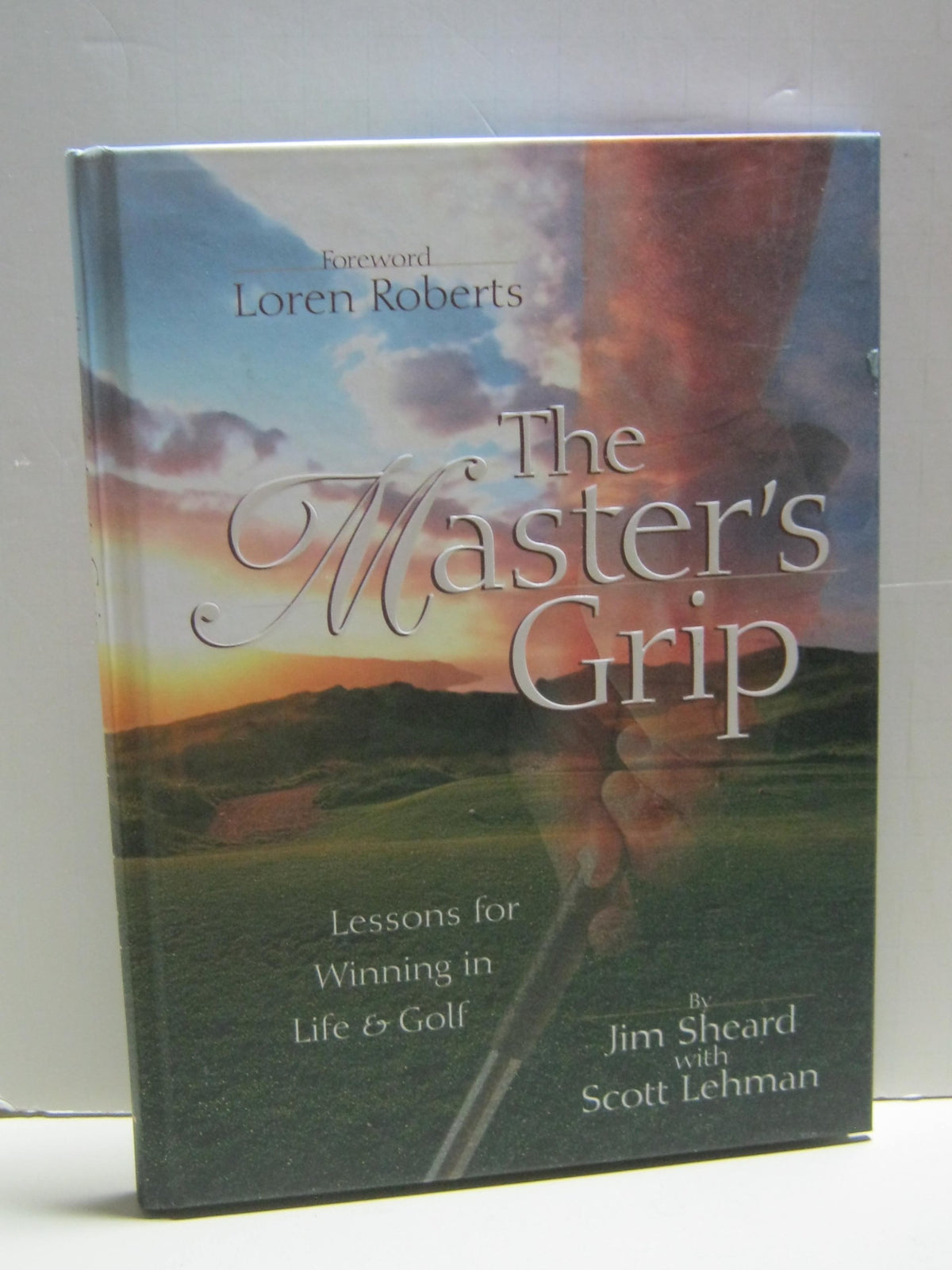 Thomas Nelson The Master's Grip book cover featuring golf-inspired devotionals for daily motivation.