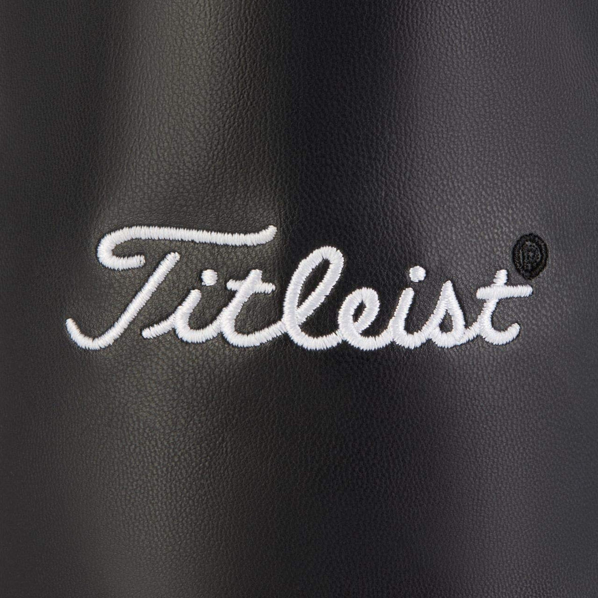 Titleist Travel Gear professional valuables golf pouch on a golf bag, portable and ready