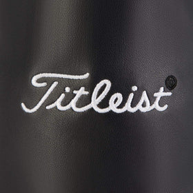 Titleist Travel Gear professional valuables golf pouch on a golf bag, portable and ready