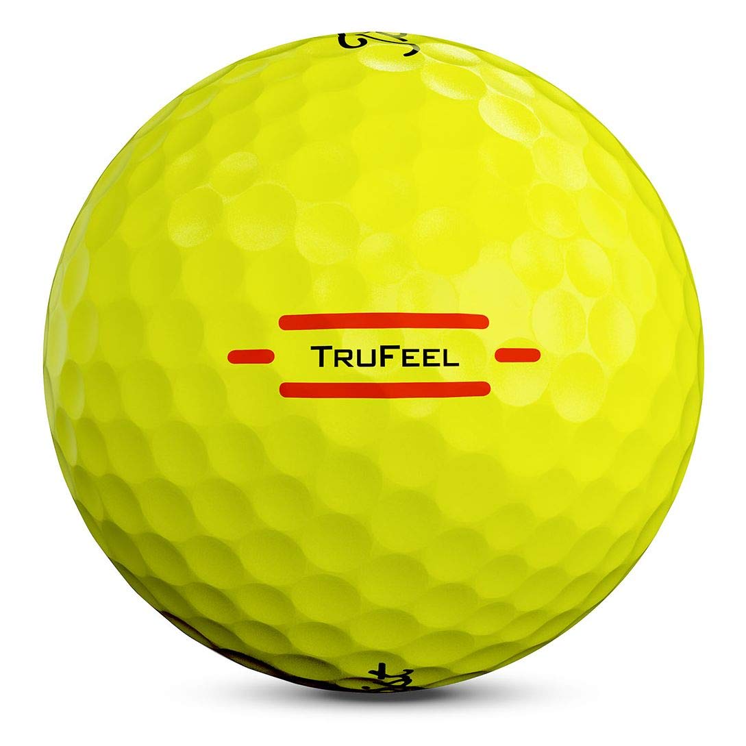 Player with Titleist TruFeel yellow ball in hand ready for a short game.