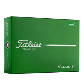 Titleist Velocity Green golf ball close-up showing dimple texture for distance