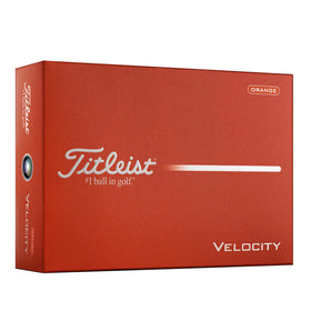 Titleist Velocity Orange ball in flight boosts visibility and distance.