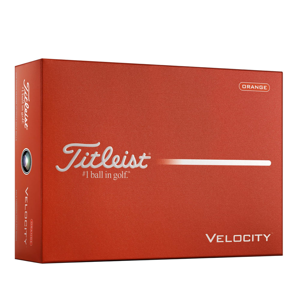 Titleist Velocity Orange ball in flight boosts visibility and distance.