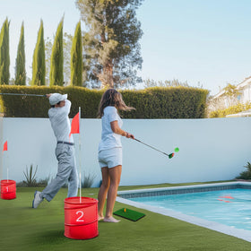 Family enjoying a park session with the Toemics golf bucket game