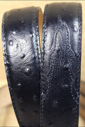 Tony Lama black ostrich dress belt leather keeper keeps the loose end neat.
