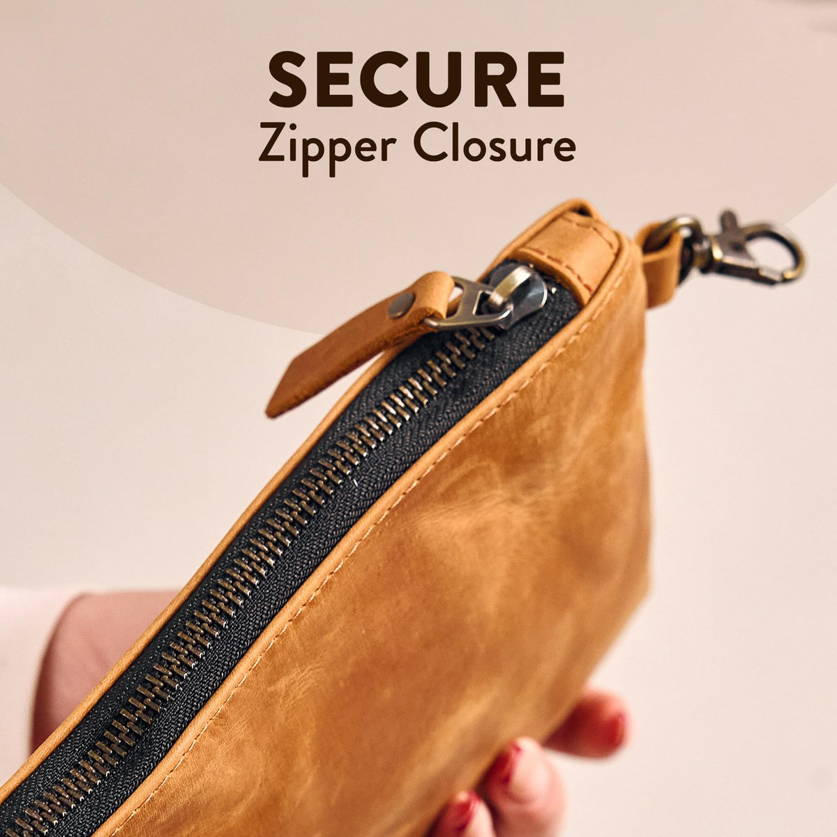 TORAKIP leather pouch with metal clip offers easy attachment to bag