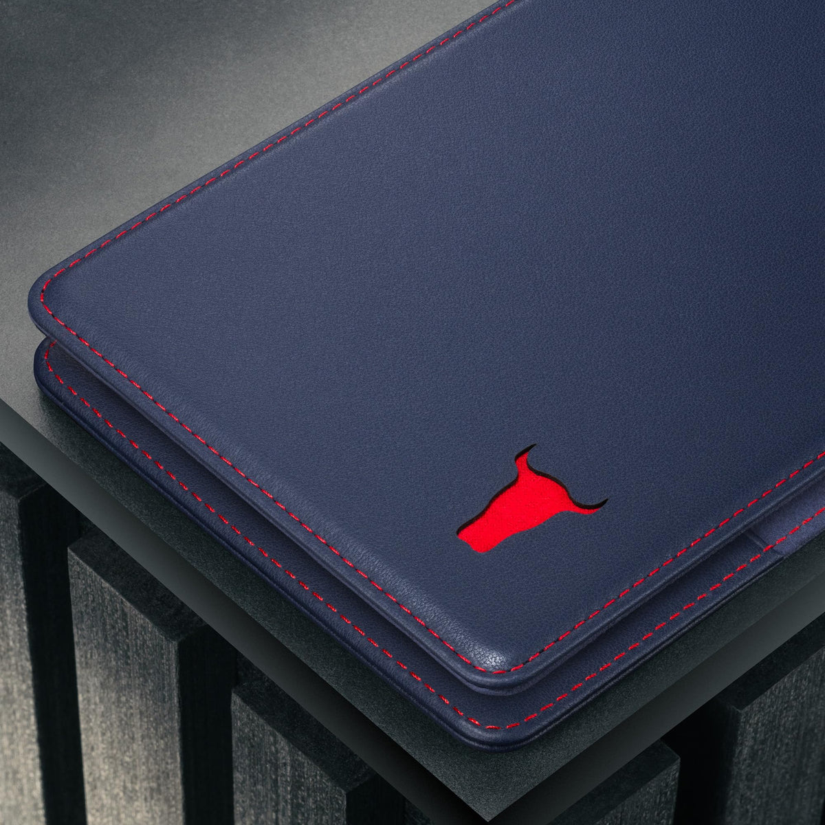 TORRO slim navy blue leather wallet ideal for on-course carry.