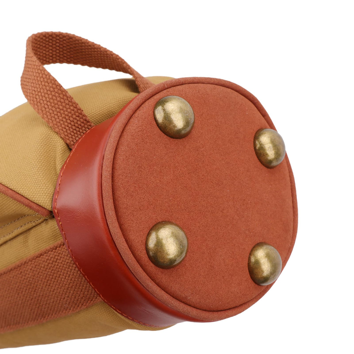 Tourbn Sunday bag leather base with studs resists wear on hard surfaces