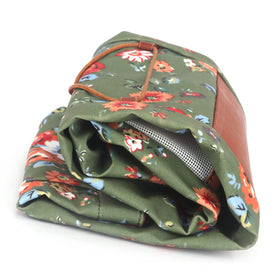 Front pocket open view with balls, tees, and tools organized.