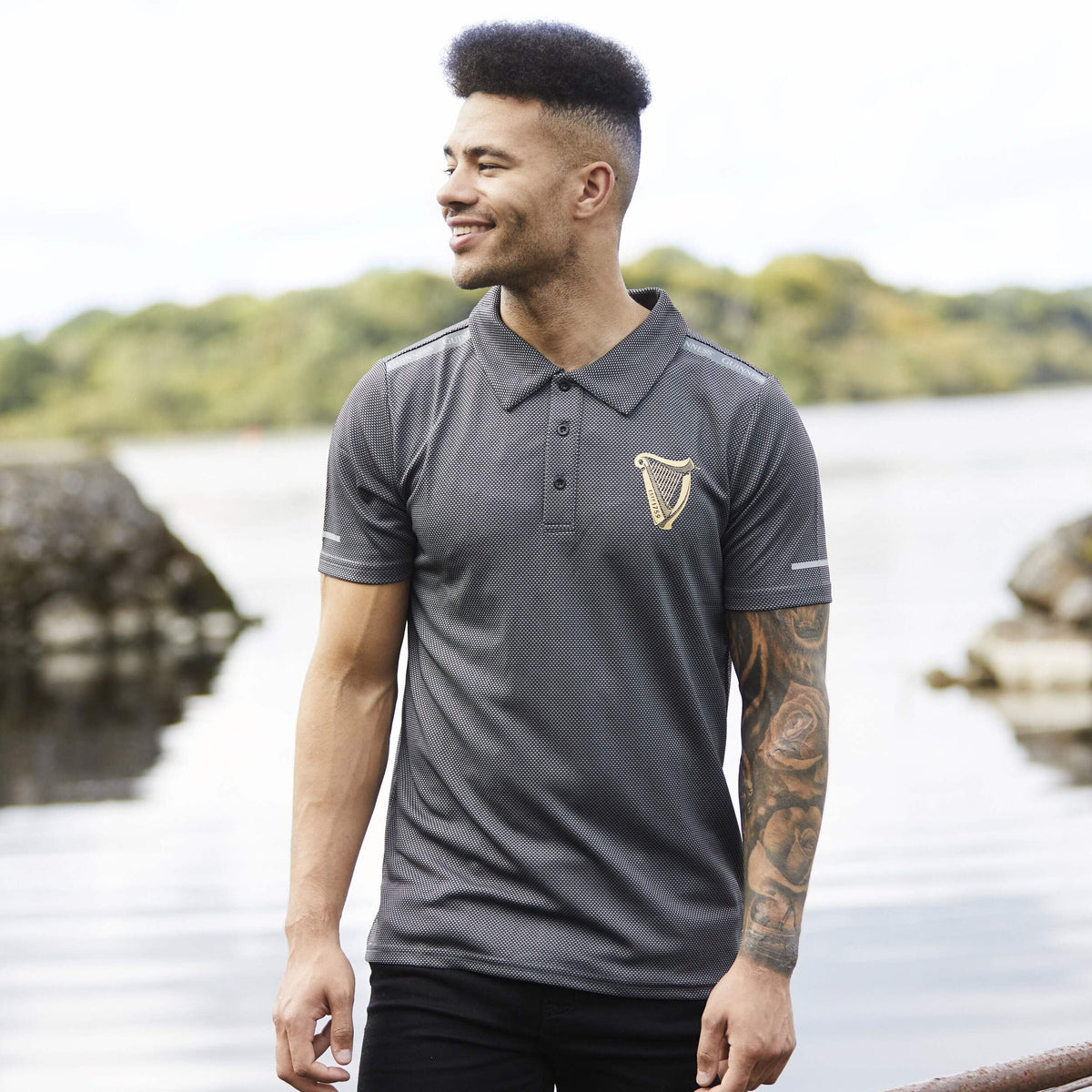 Traditional Craft Guinness harp polo shirt side view highlighting relaxed fit.