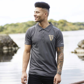 Traditional Craft Guinness harp polo shirt side view highlighting relaxed fit.