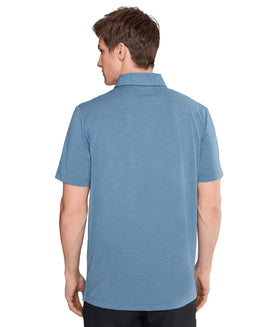 TravisMathew Heater Active Polo hem with side vents for comfort and layering
