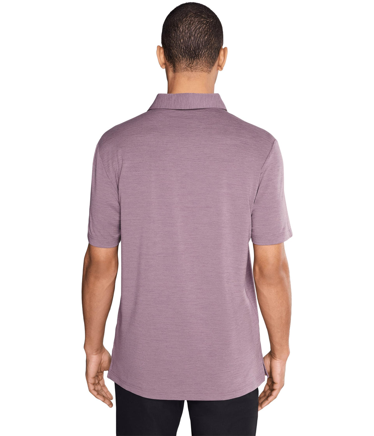 TravisMathew Heater Active Polo side vents and straight hem in use