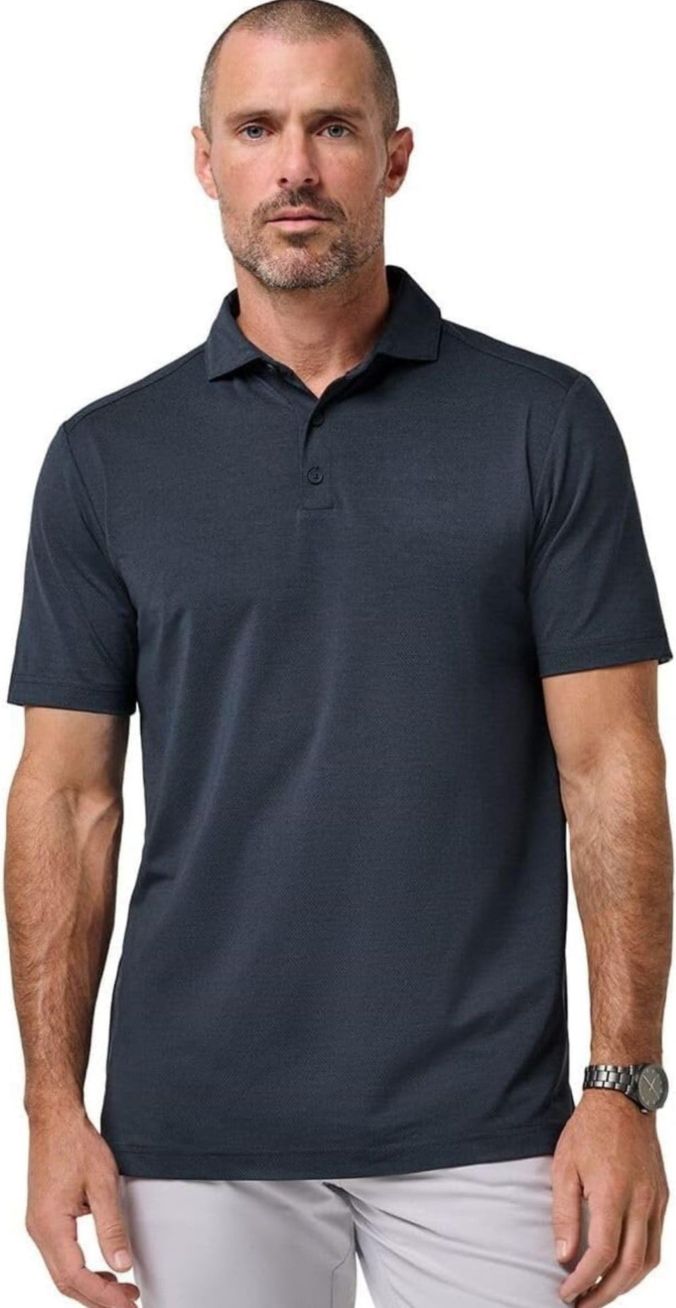 TravisMathew Heater Active Polo Total Eclipse; front view shows a clean silhouette for versatile styling.