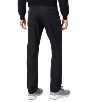 TravisMathew Open to Close Black 30 side view highlights mobility and stretch