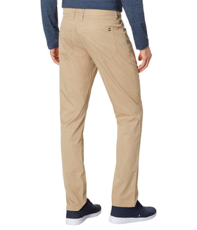 TravisMathew Open to Close Khaki 30 side view showing relaxed fit and stretch