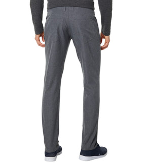 TravisMathew Open to Close pants waistband detail in Heather Dark Grey highlighting stretch.