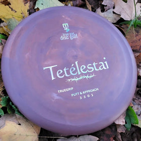 True Par Tetelestai grip detail highlighting micro bead and thumb track